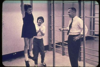 Black and white photo of Dr. Frank conducting fitness tests at the Beverley School in 1960s