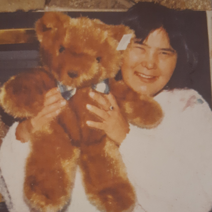 Al Dyer's sister Eloise holds a teddy bear in an old photo.