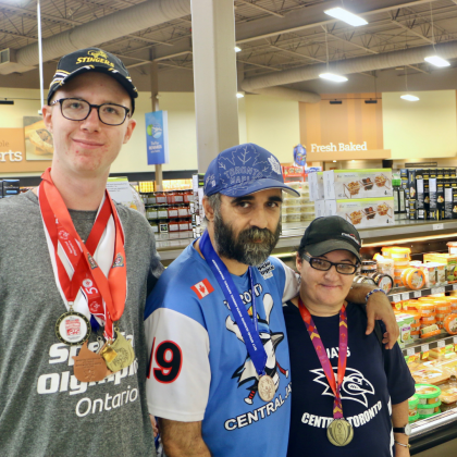 Special Olympics athletes pose for a photo at Sobeys