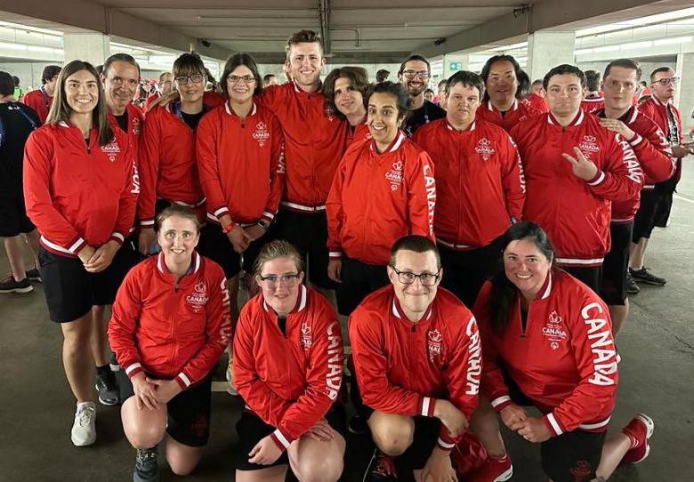 Special Olympics Team Canada 2023 members from B.C. pose and smile in the marshalling area before the 2023 World Games Opening Ceremony