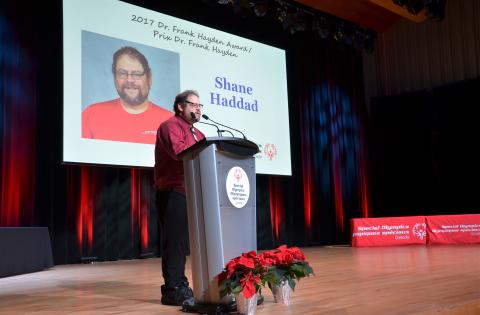 "Shane Haddad speaks at a podium at the Special Olympics Canada National Awards 2017.