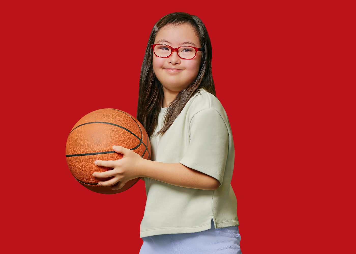 Maire O'Connor with red background.