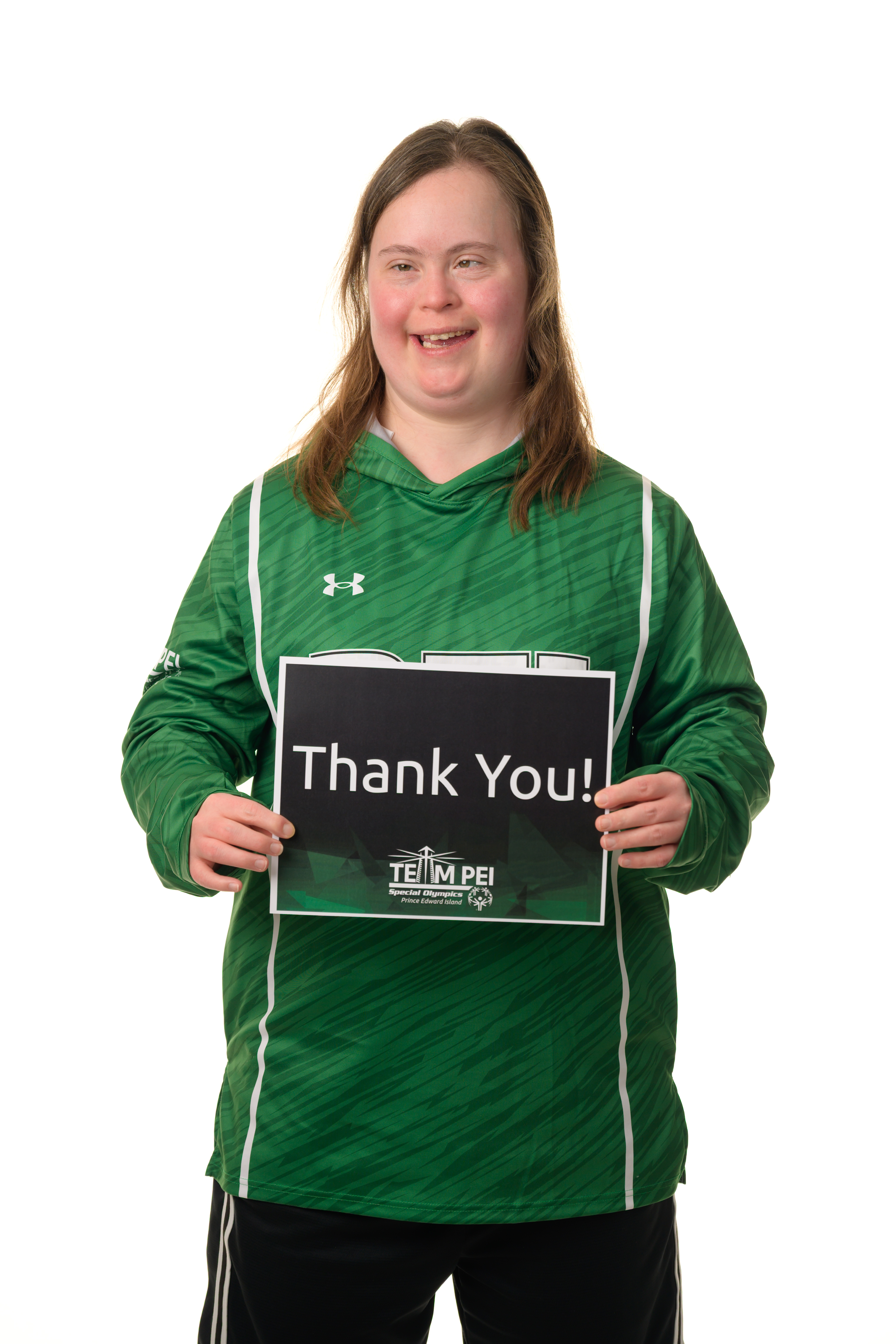 Team PEI 2026 Basketball athlete, Rachael Loggie, holding a thank you sign