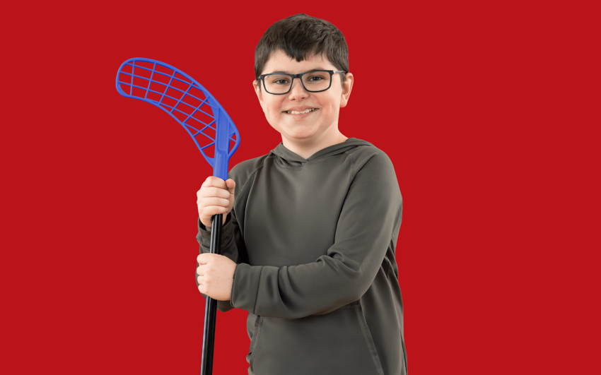 Rhyker Evanishen-Menzies with red background.