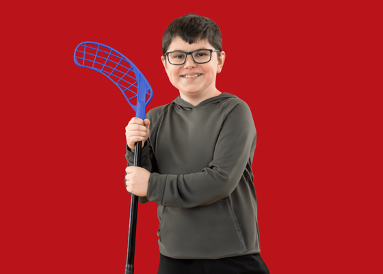 Rhyker Evanishen-Menzies with red background.