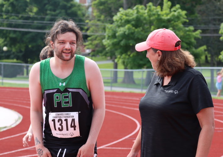 Male Athletes at SONS 2024 for Athletics, Special Olympics PEI, Athletics, Athlete with Coach
