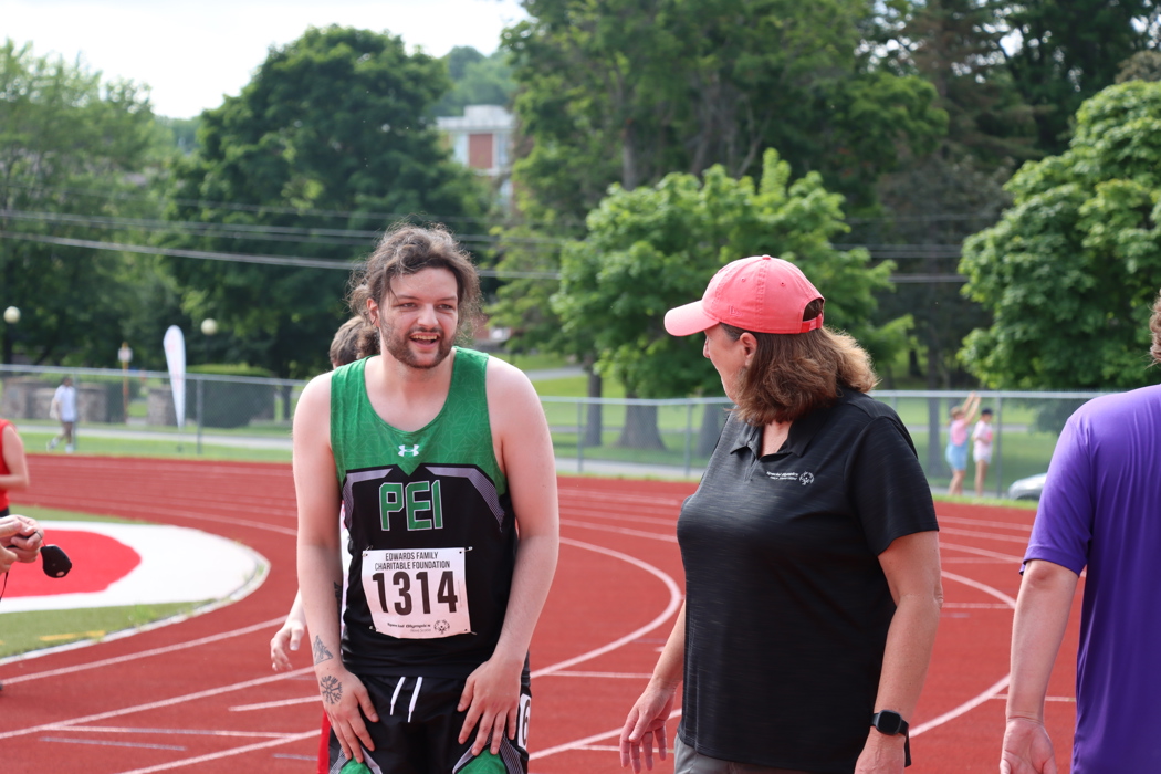 Male Athletes at SONS 2024 for Athletics, Special Olympics PEI, Athletics, Athlete with Coach