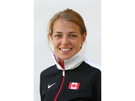 Headshot of a woman with in a Team Canada zip up jacket. Headshot of a woman with in a Team Canada zip up jacket.