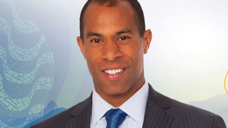 Headshot of a man in a suit. Headshot of a man in a suit.