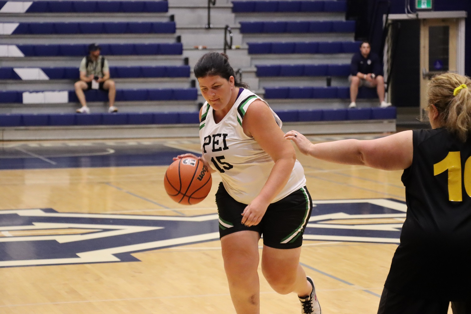 Special Olympics PEI, Basketball, Athlete Playing Basketball 