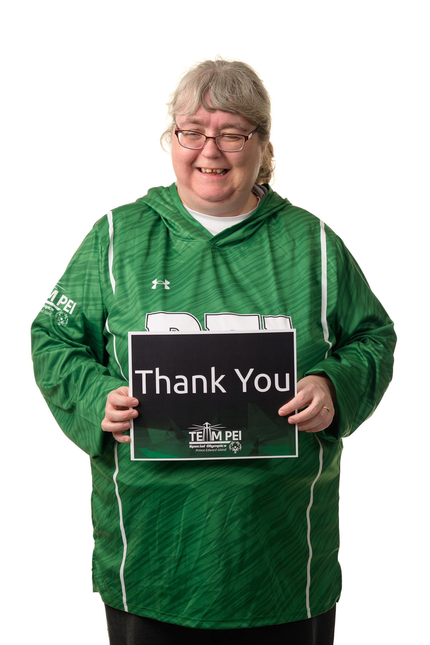 Team PEI 2026 Bocce athlete, Rolanda Bridges, holding a thank you sign