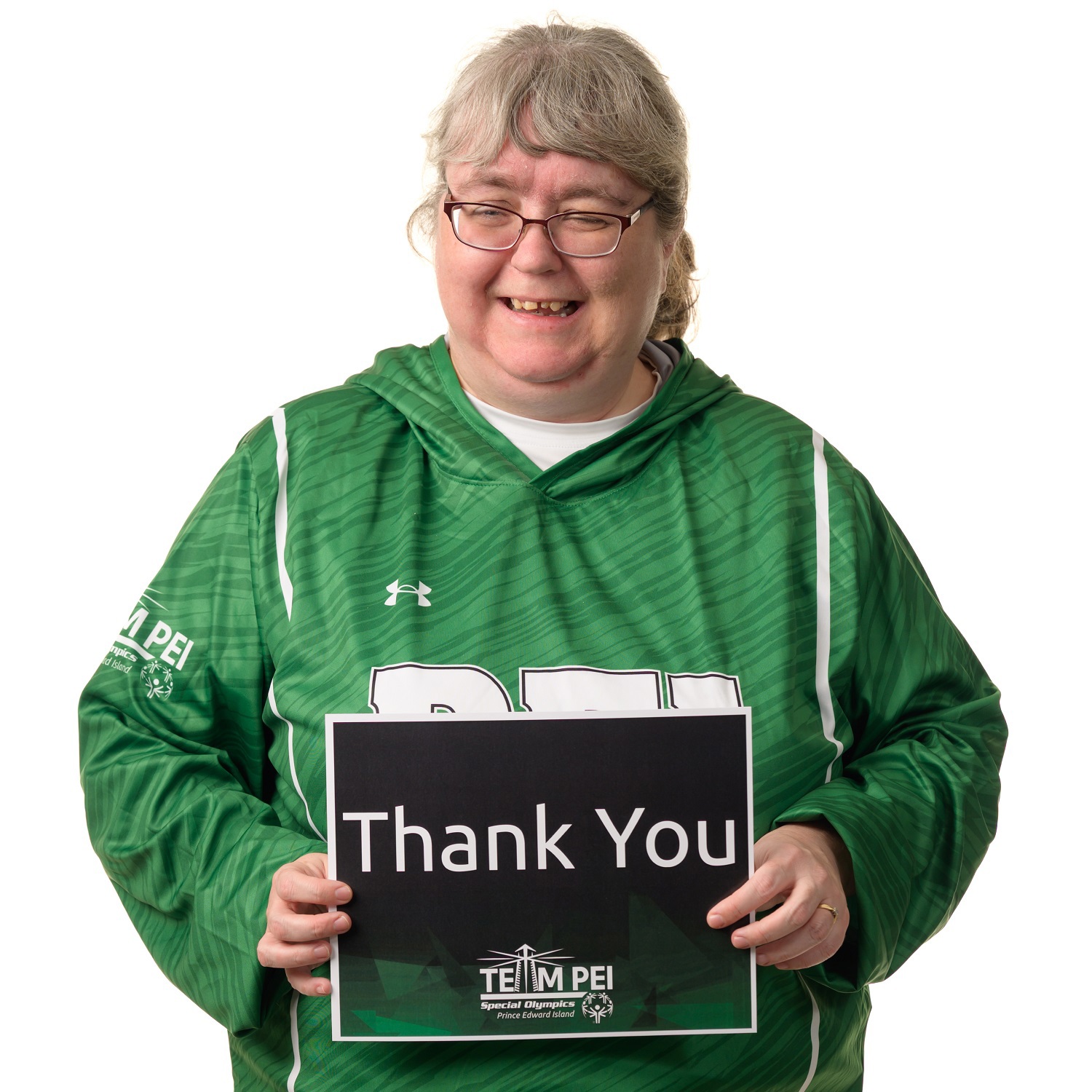 Team PEI 2026 Bocce athlete, Rolanda Bridges, holding a thank you sign