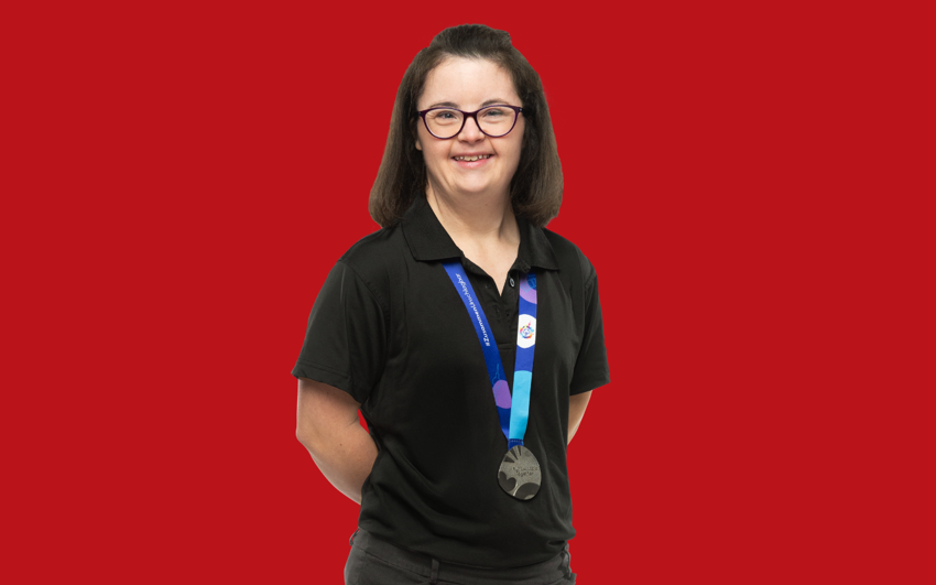 Allie Price with red background.