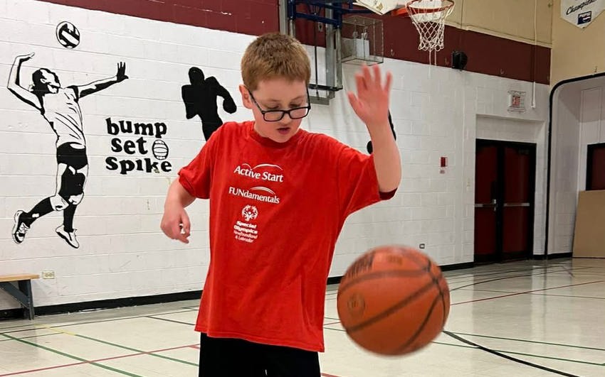 Alexander playing basketball 