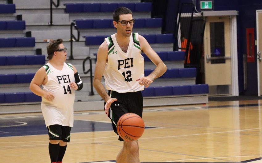 Team PEI 2026 Basketball athlete, Conner Arsenault, dripples the basketball down the court