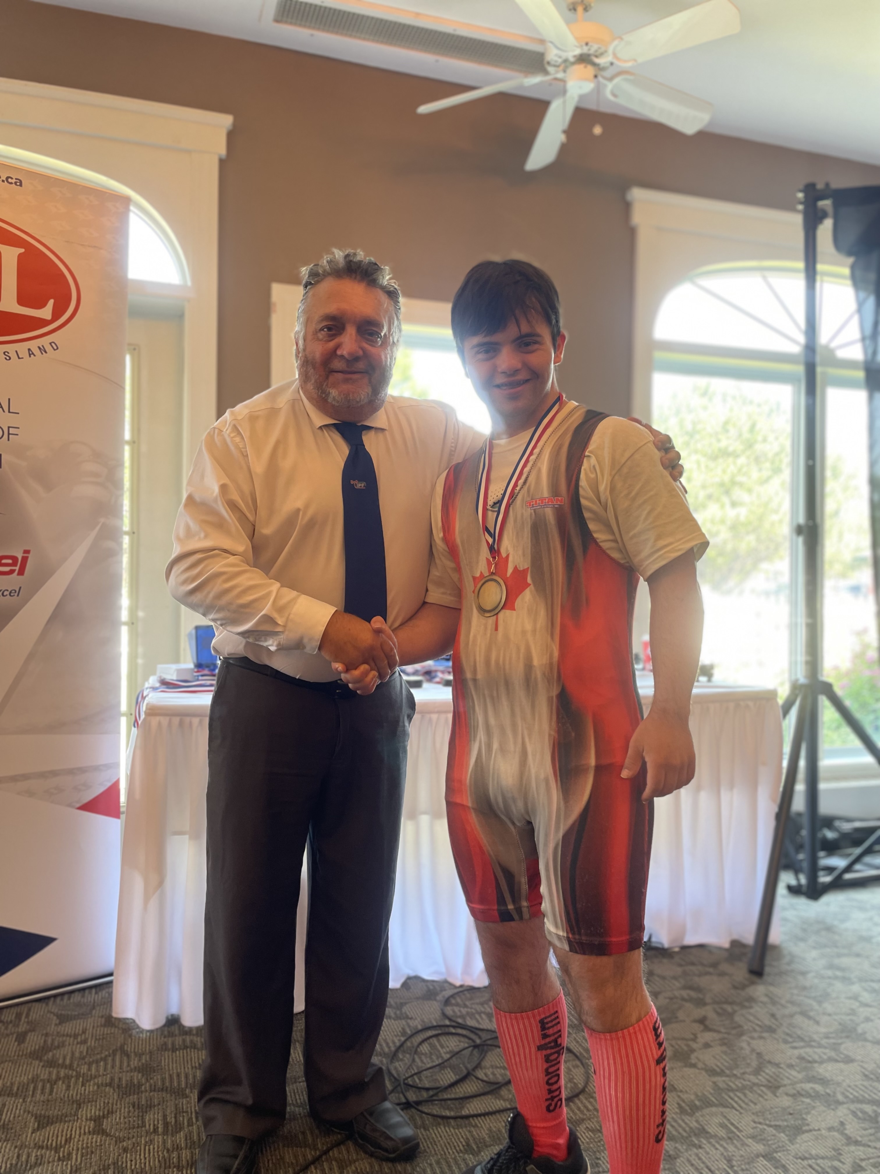 Special Olympics PEI, Powerlifting, Athlete with Medal
