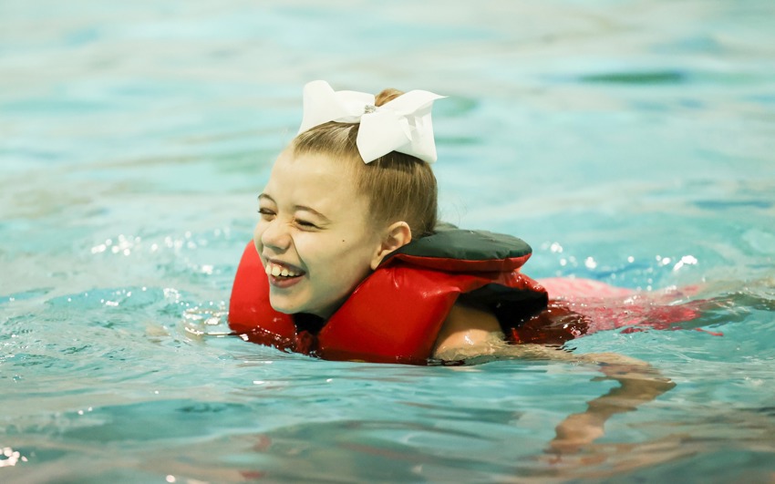 Sophia swimming at the pool. 