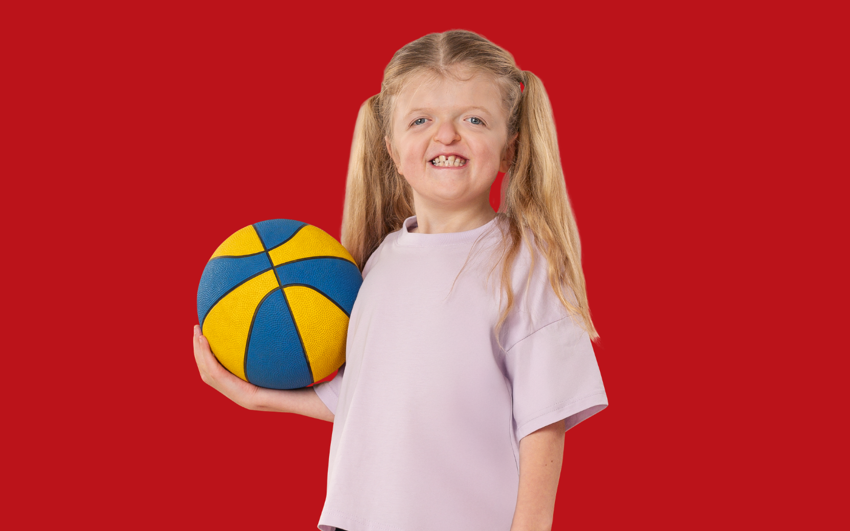 Madelyn Murphy with red background. 