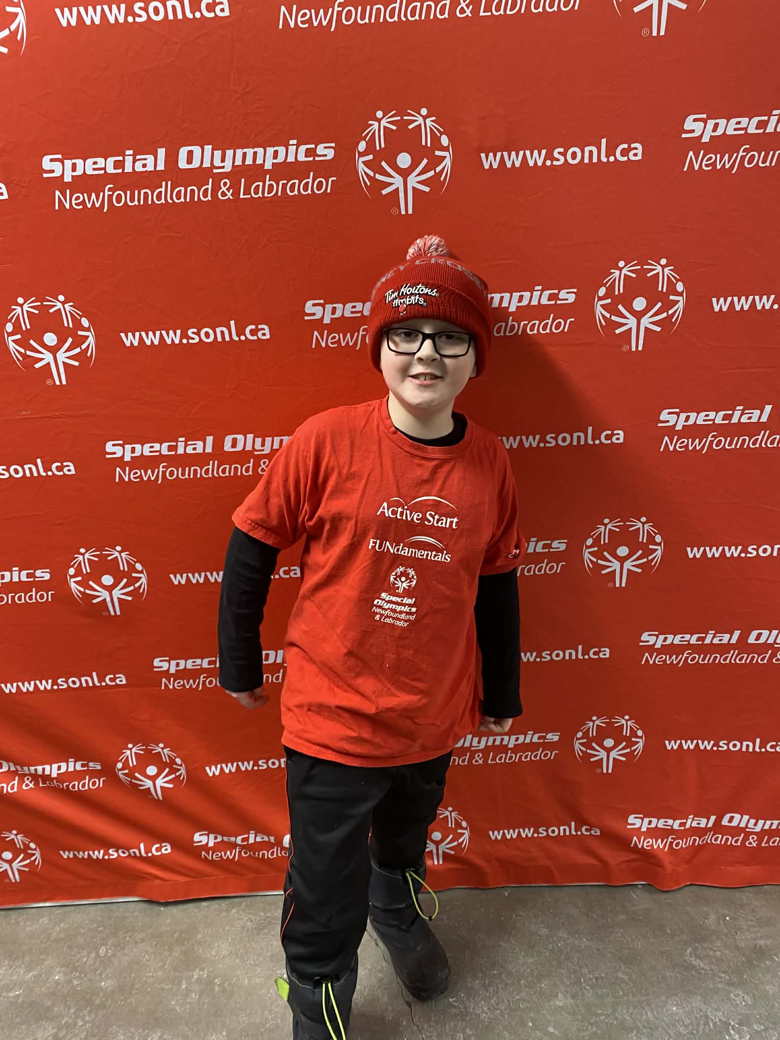 Alexander posing at a Special Olympics event. Alexander posing at a Special Olympics event.