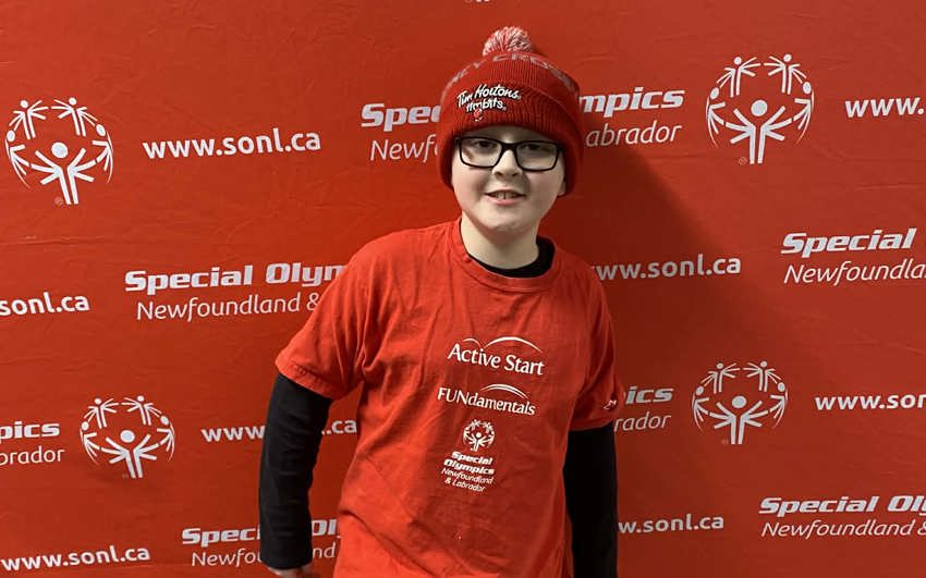 Alexander posing at a Special Olympics event.