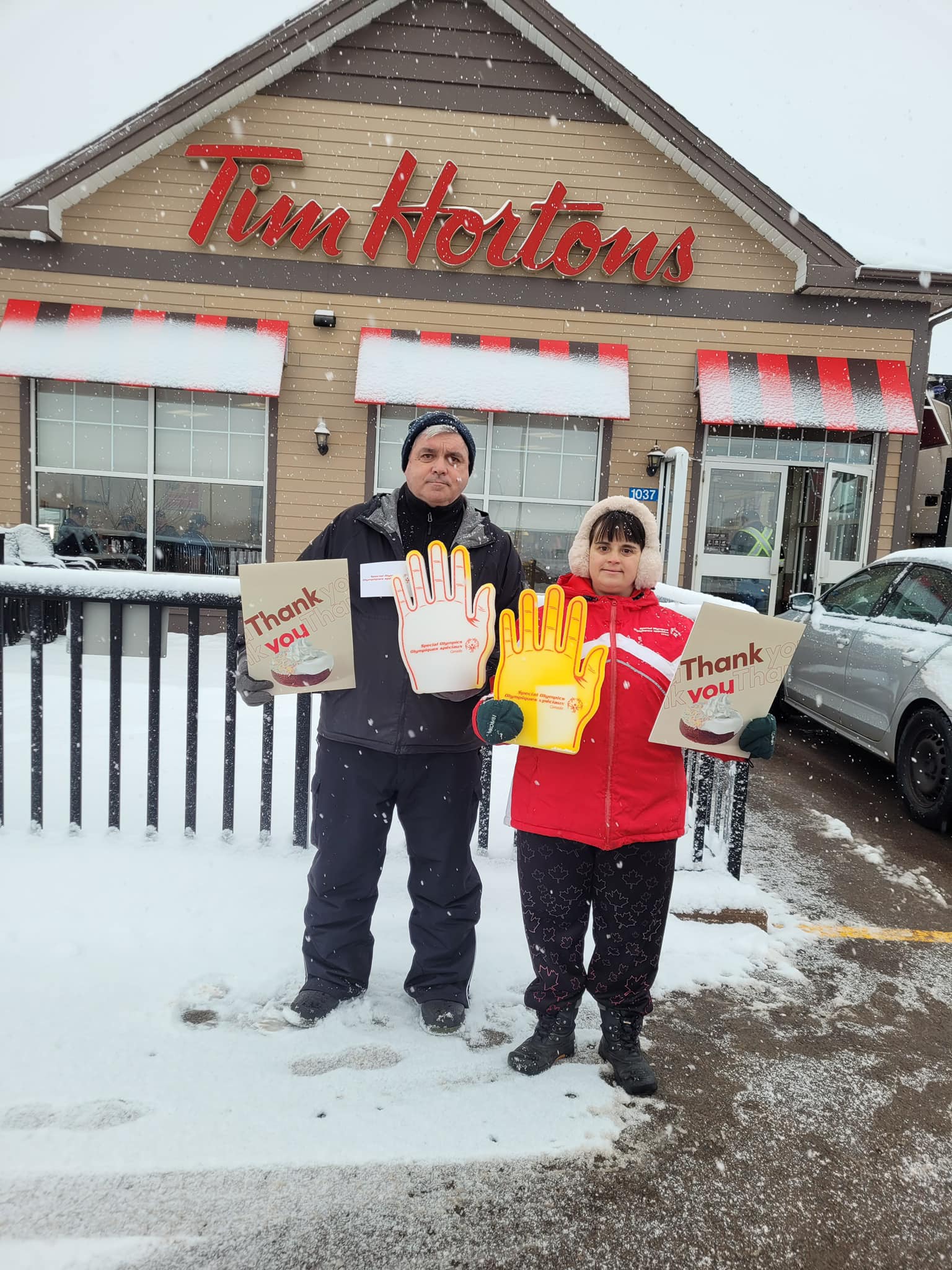 Special Olympics PEI Donut Ambassadors promoting the Special Olympics Donut at Tim Hortons