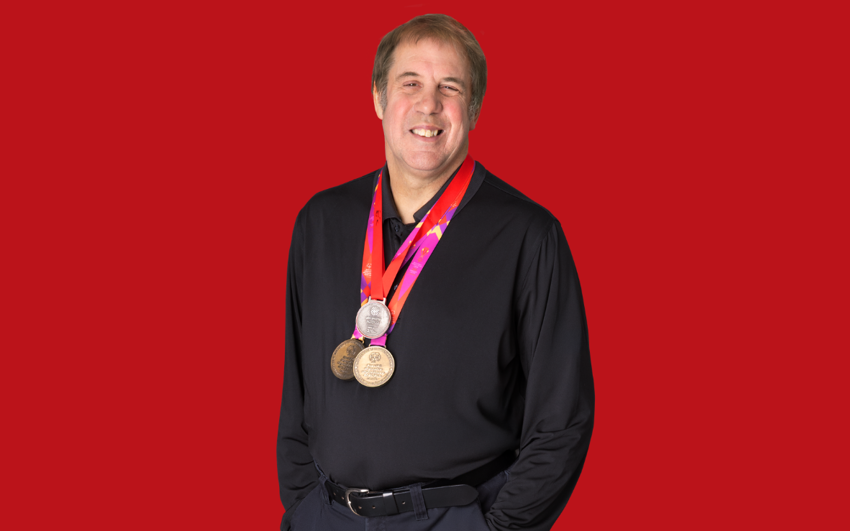 Bill Smith with red background.