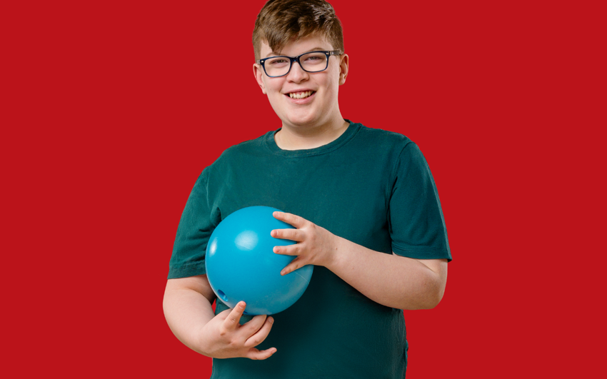 Gabe Hunt with red background.