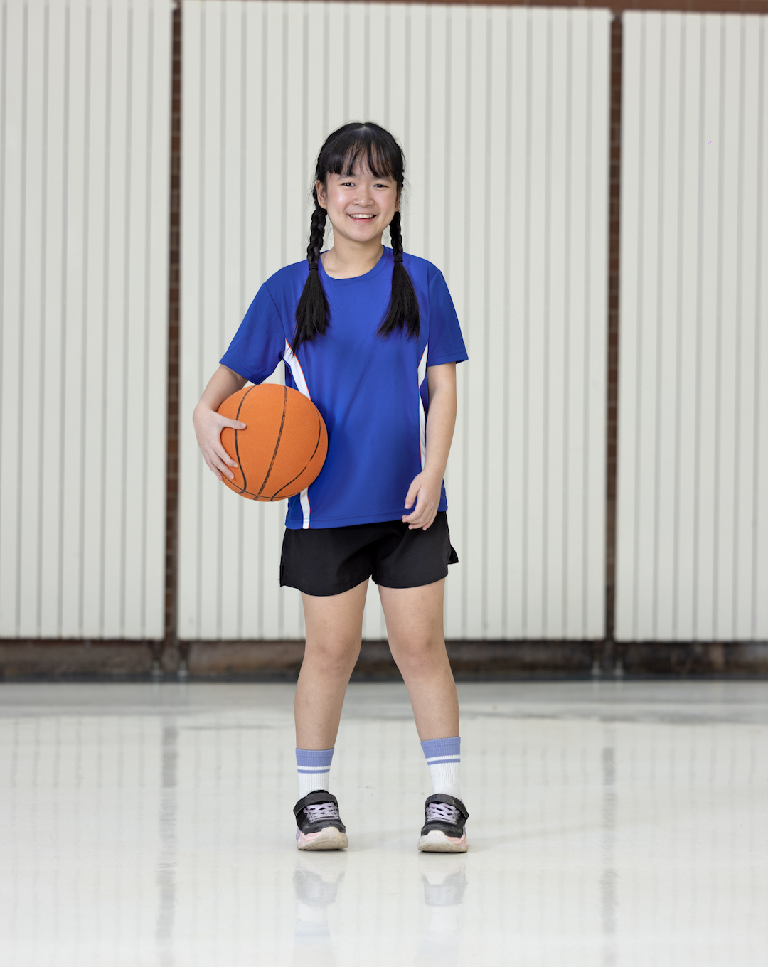 Special Olympics PEI, Empire Campaign, Athlete with Basketball