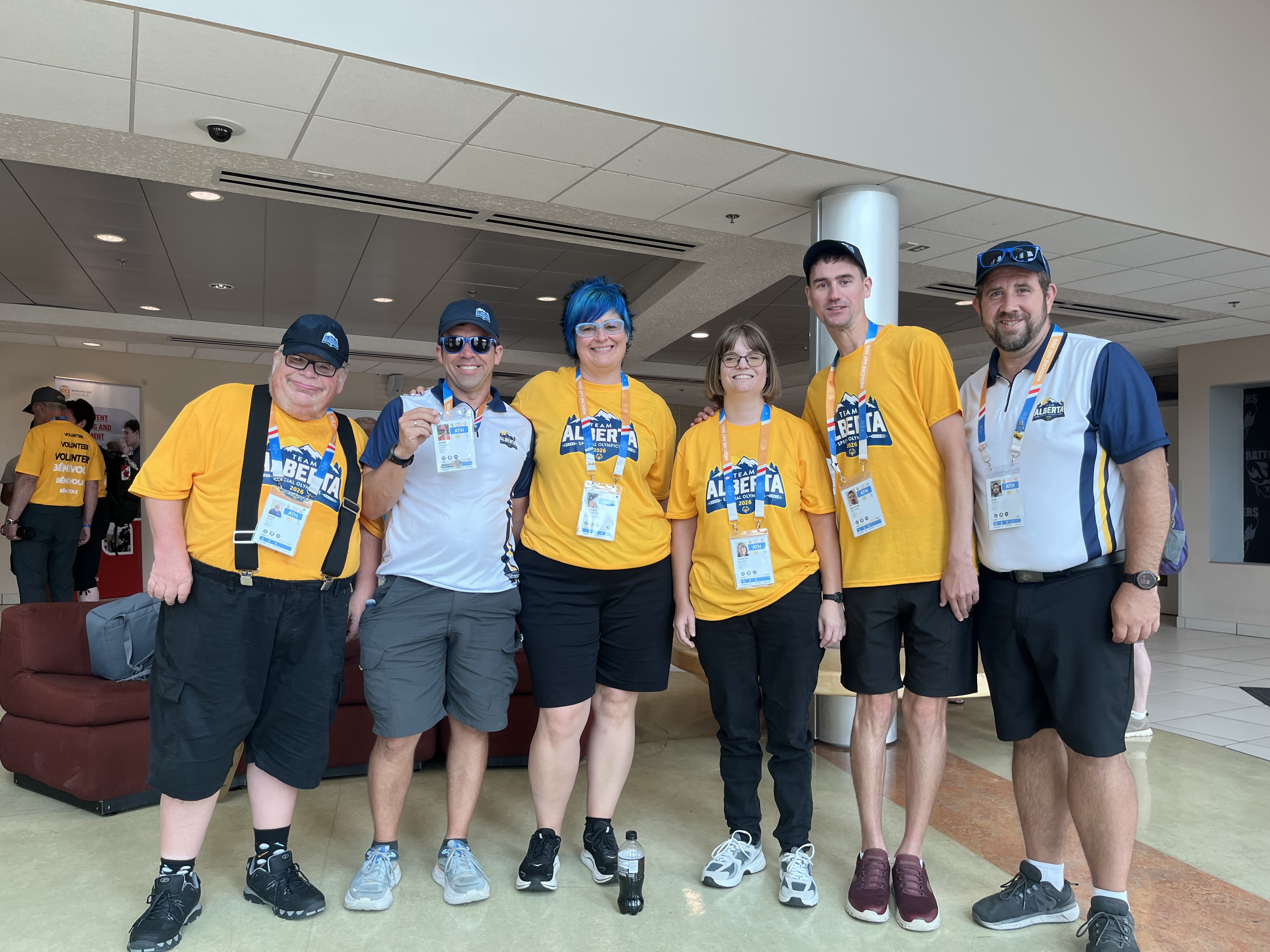 Athletes and mission staff from Special Olympics Alberta’s golf team. From left to right: Doug Edey, Shane Stewart, Mary-Ann Stewart-Lind, Jennifer Gushta, Brendon Mercier, and Josh Engel. All posing for the camera in Team Alberta Apparel. Athletes and mission staff from Special Olympics Alberta’s golf team. From left to right: Doug Edey, Shane Stewart, Mary-Ann Stewart-Lind, Jennifer Gushta, Brendon Mercier, and Josh Engel. All posing for the camera in Team Alberta Apparel.