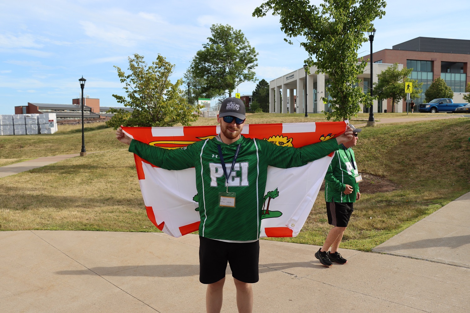 SOPEI Athlete Logan Robbins holding the Team PEI flag at the SONS games July 2025 SOPEI Athlete Logan Robbins holding the Team PEI flag at the SONS games July 2025