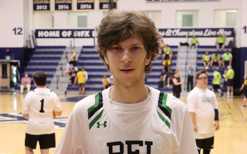 Team PEI 2026 Basketball athlete, Zachary Hebert, stands on the court holding a basketball