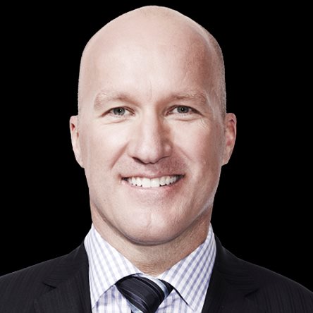 Headshot of a man wearing a suit Headshot of a man wearing a suit