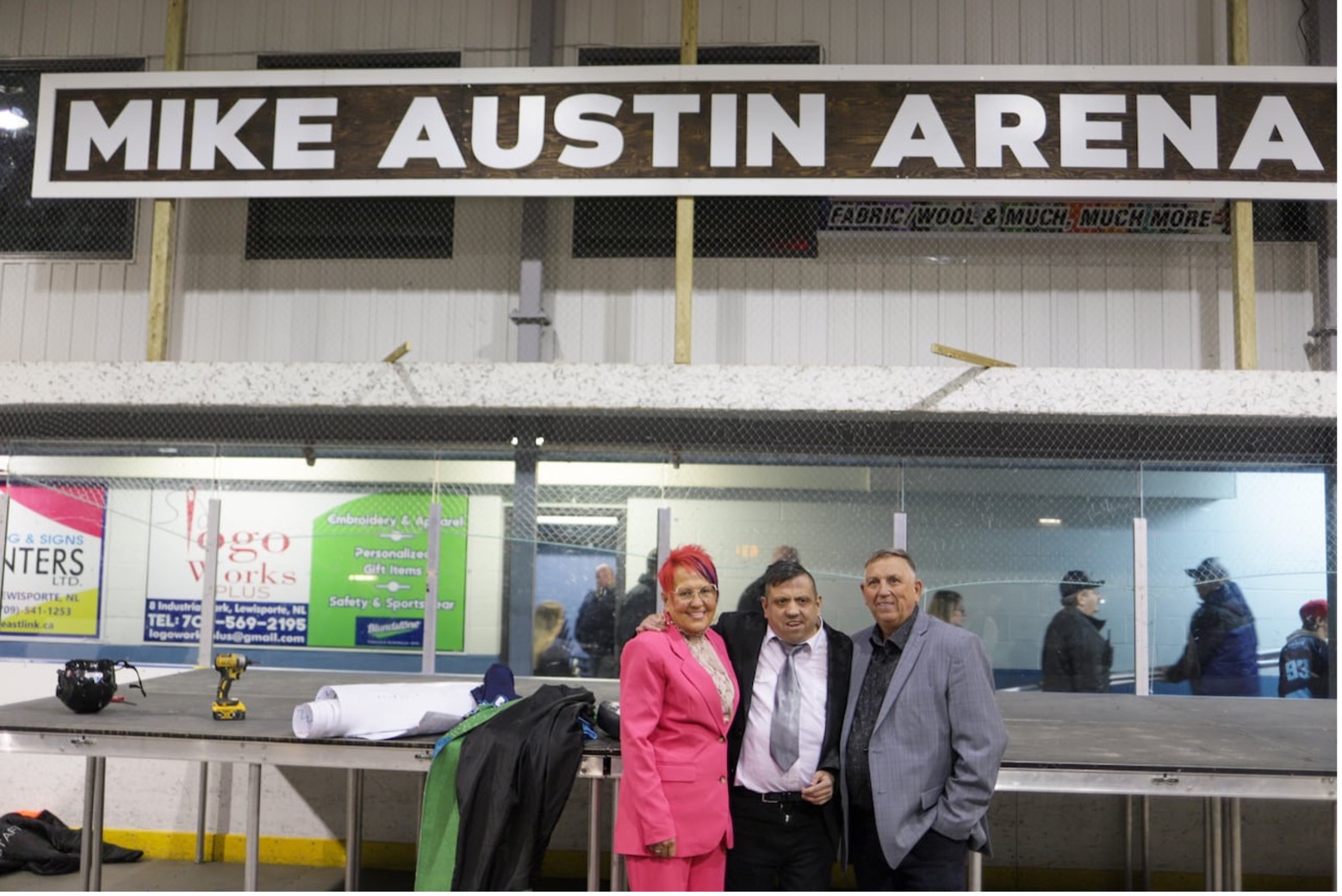 Mike Austin and parents pictured in front of the 'Mike Austin Arena' sign. Mike Austin and parents pictured in front of the 'Mike Austin Arena' sign.