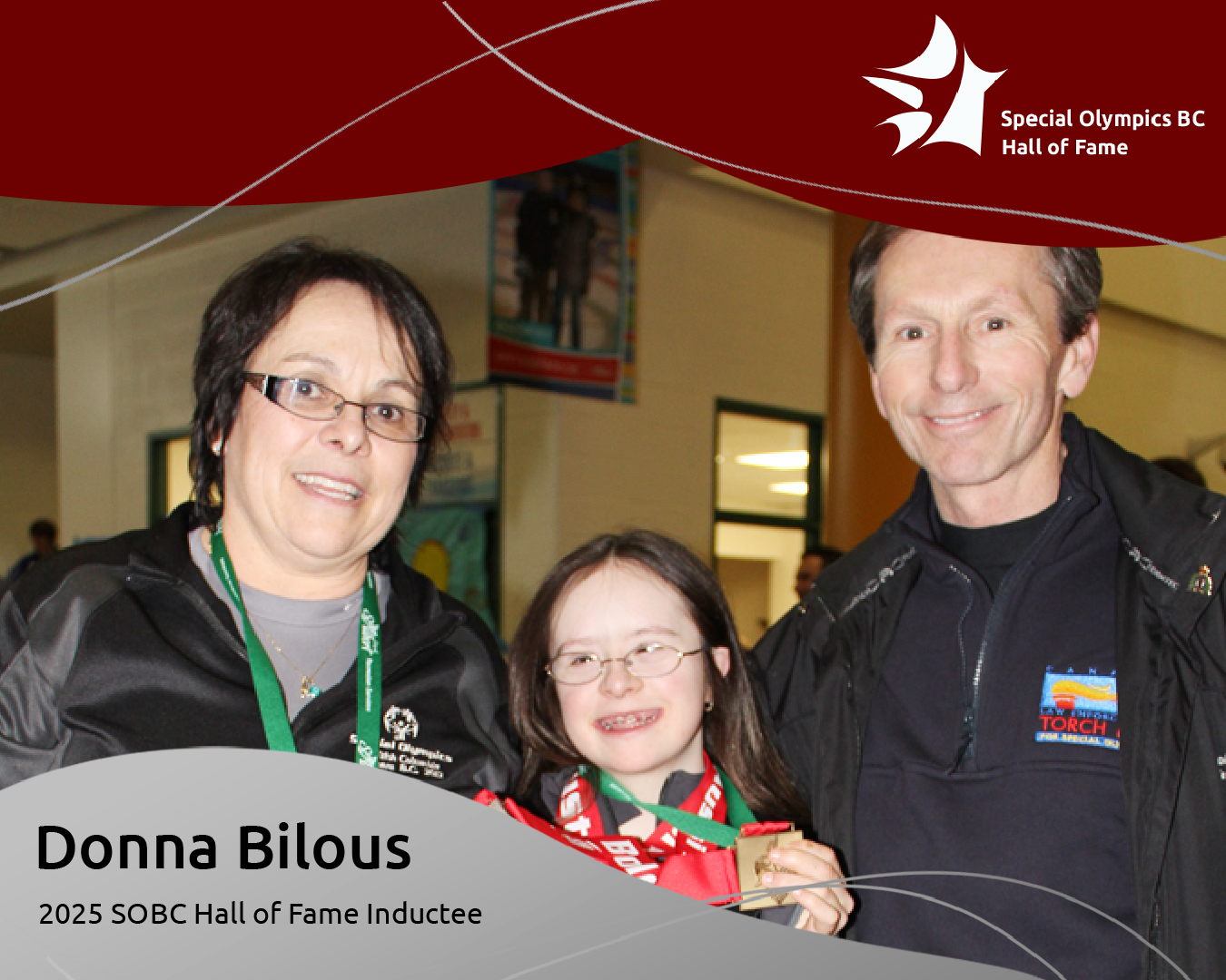 Image of Donna Bilous with medal-winning daughter Paige and husband Tom