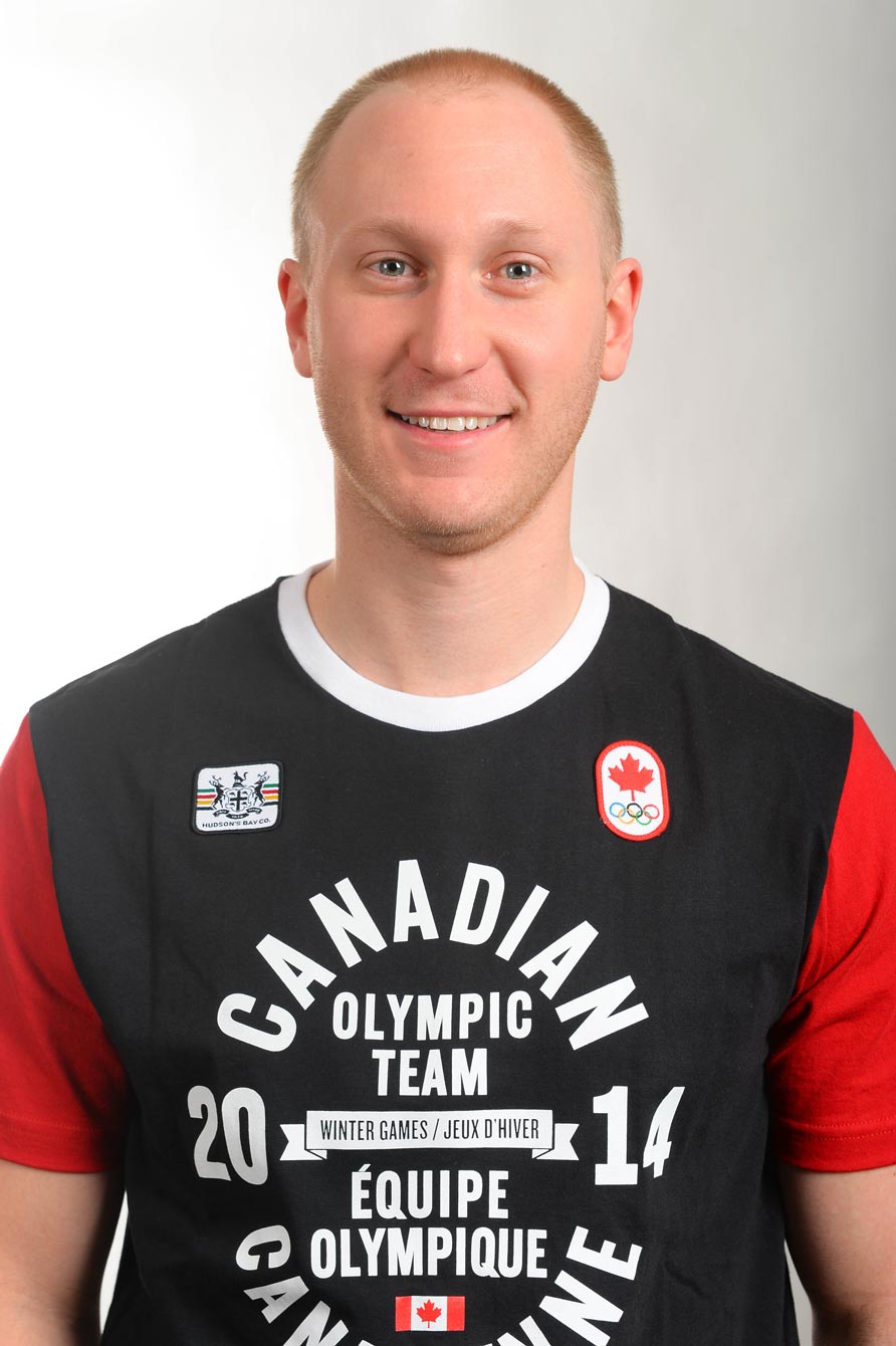 Headshot of a man wearing a jersey with Canadian Olympic Team Winter Games 2014. Headshot of a man wearing a jersey with Canadian Olympic Team Winter Games 2014.