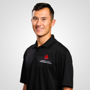 Headshot of a man wearing a black polo with the Skate Canada logo Headshot of a man wearing a black polo with the Skate Canada logo