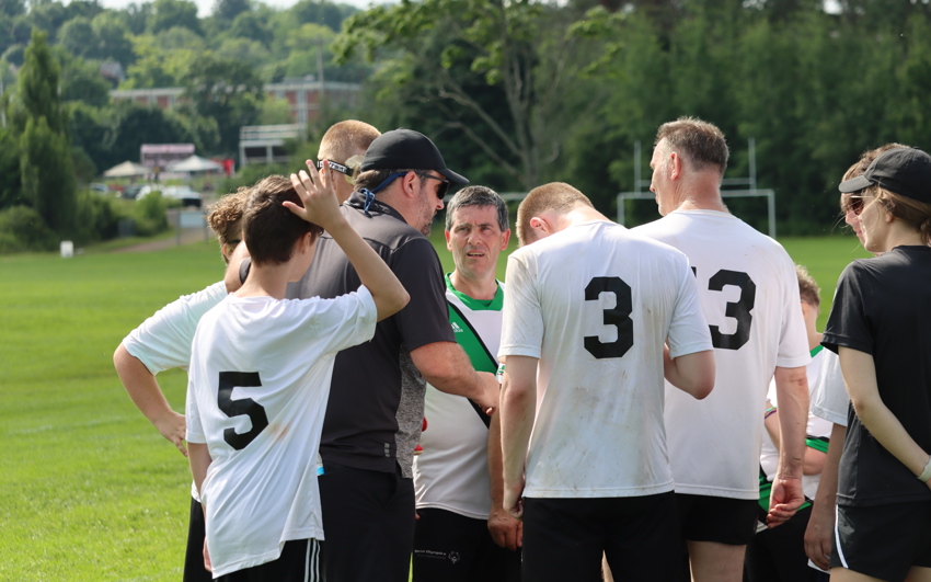 Special Olympics PEI, Soccer, Coach with Athletes