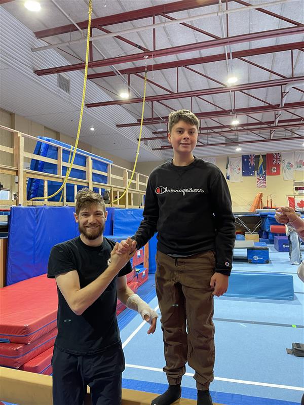 Male gymnastics athlete in the gym 