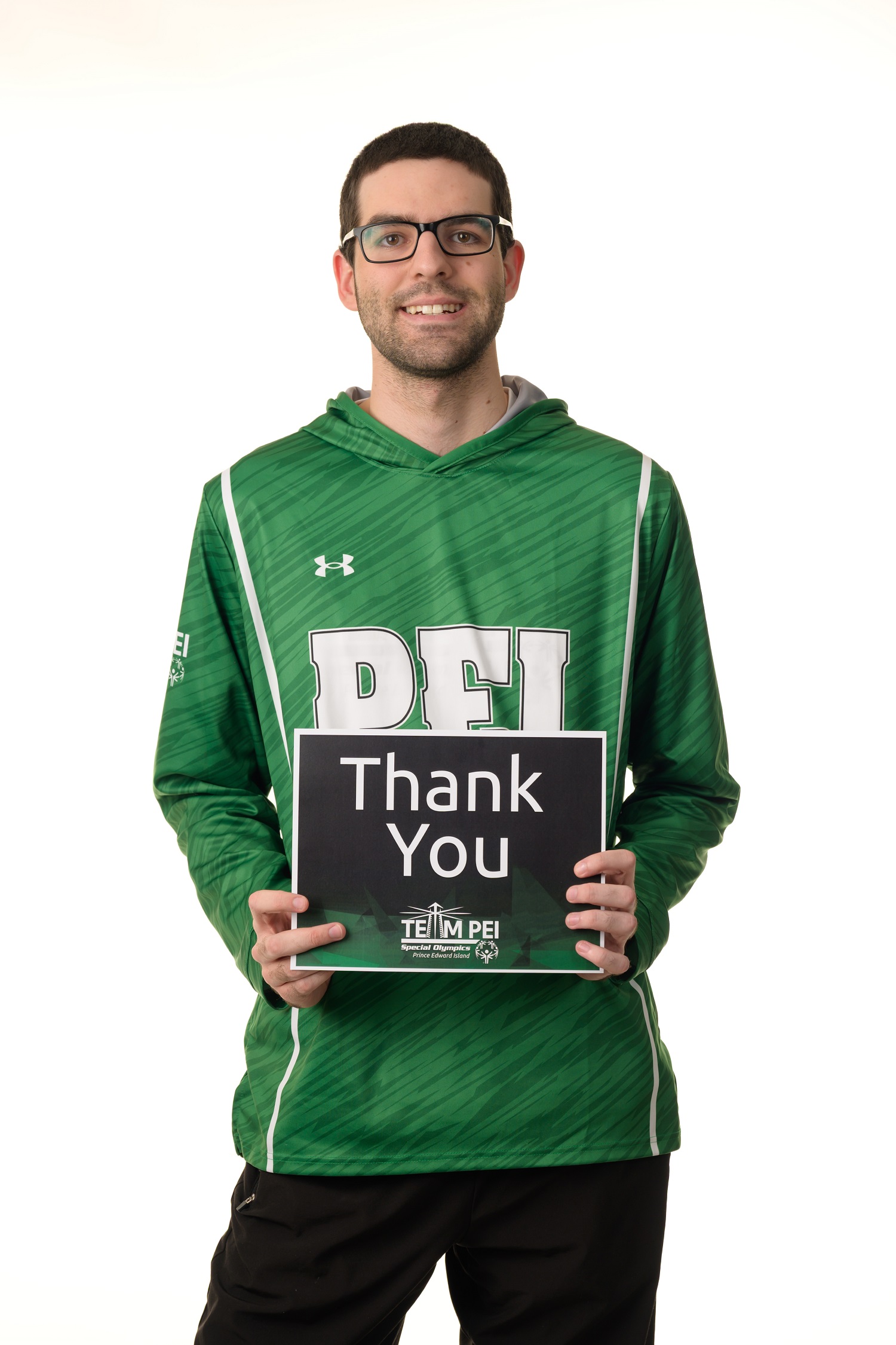 Team PEI 2026 Basketball athlete, Conner Arsenault, holding a thank you sign