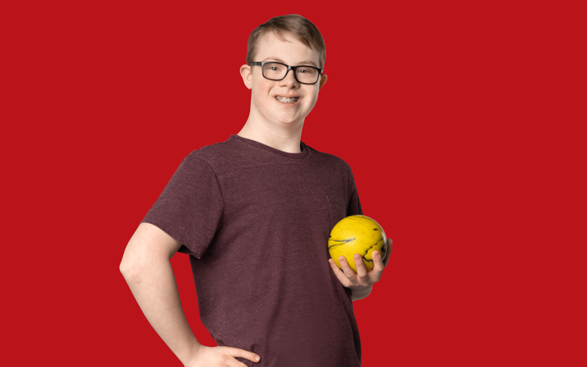 Gage Mechefske with red background.