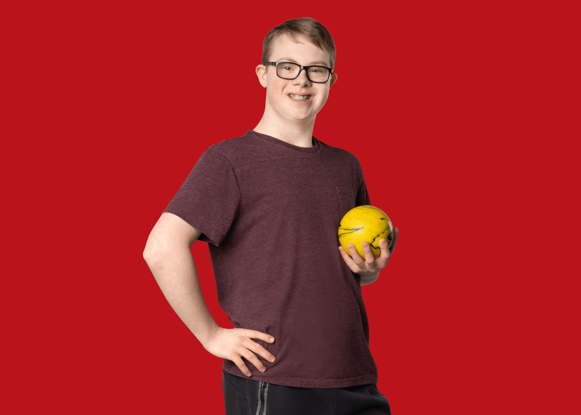 Gage Mechefske with red background.