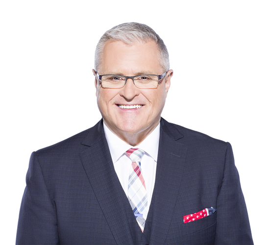 Headshot of a man wearing a suit. Headshot of a man wearing a suit.