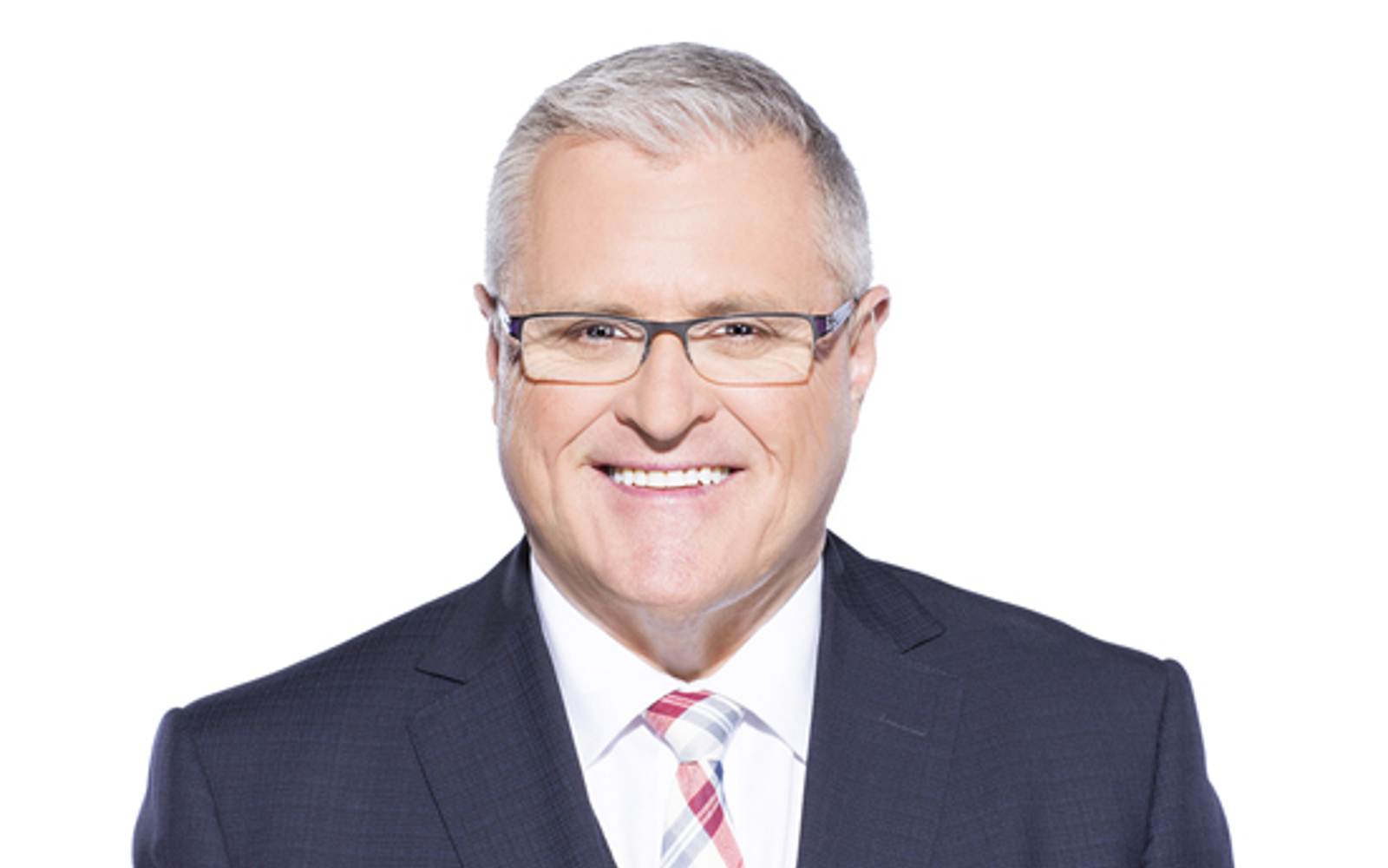 Portrait d'un homme en costume.