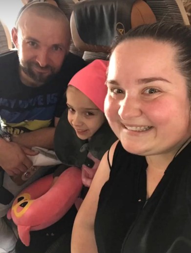 Lilliana with parents.jpg