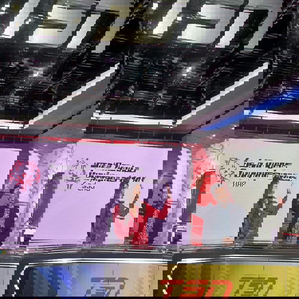 TSN hosts in front of SOBC advertisement 