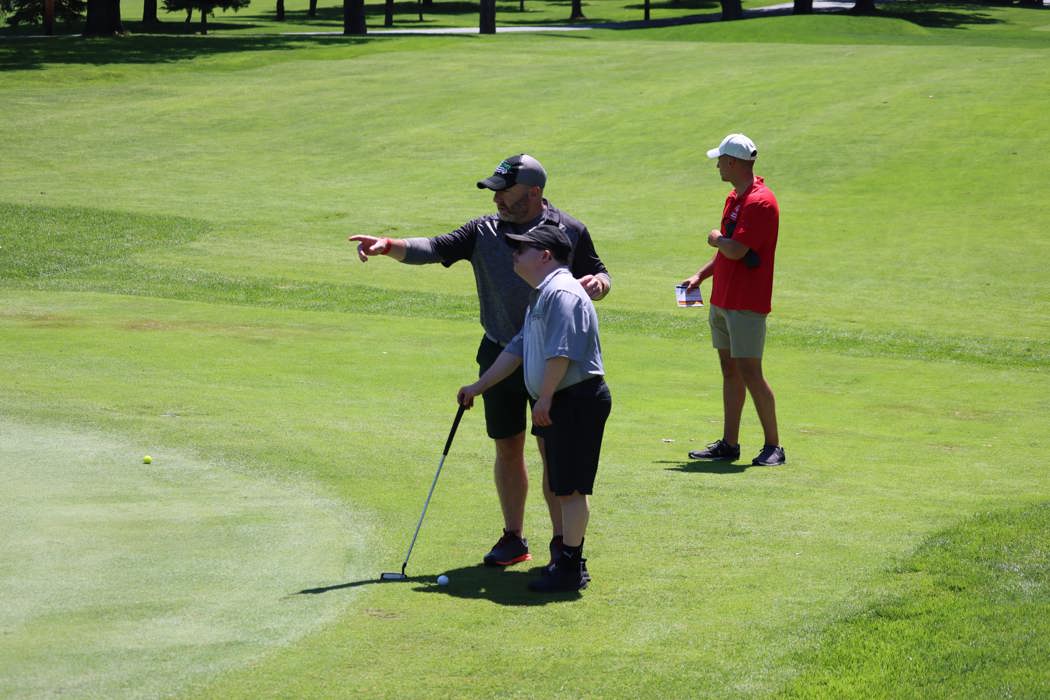 Special Olympics PEI, Golf, Volunteer with Athlete on the course