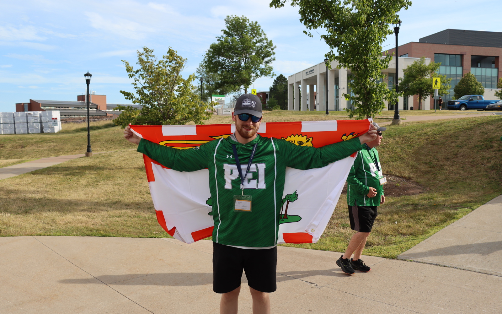 SOPEI Athlete Logan Robbins holding the Team PEI flag at the SONS games July 2025