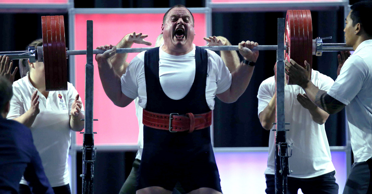 Jackie Barrett screams out as he competes in the squat competition at the World Games in LA