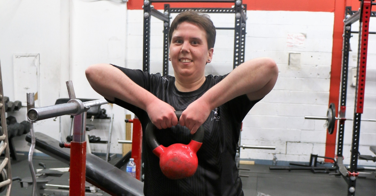 Lisa McDermott holds up a kettlebell as she trains at the gym in the lead up to Special Olympics World Games.