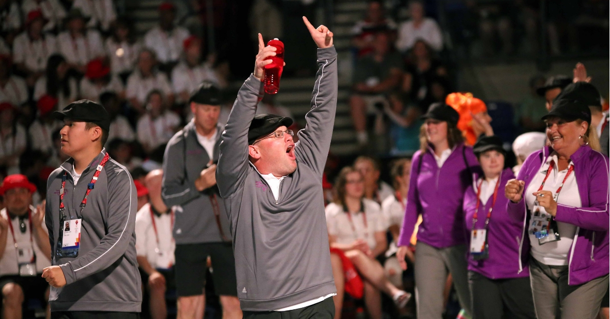 Gaetan cheers at a Special Olympics event.